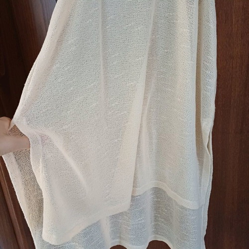 Summer blouse used, semi-transparent long with longer back