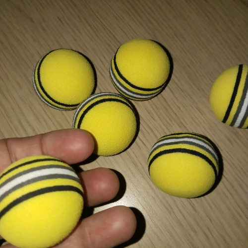 Set of yellow cat toy balls new