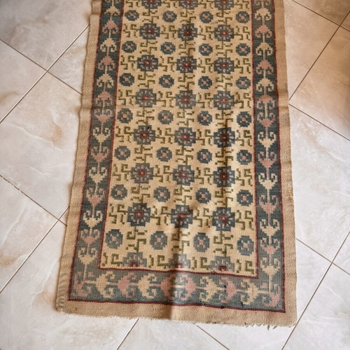 Handwoven rug used, 95 x 182 cm
