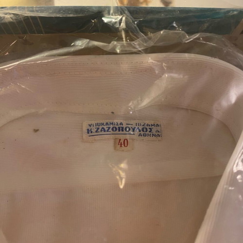White dress shirt used, unworn, in original packaging