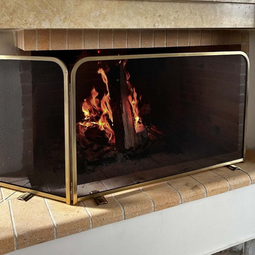 Fireplace screen trifolding with tool set used