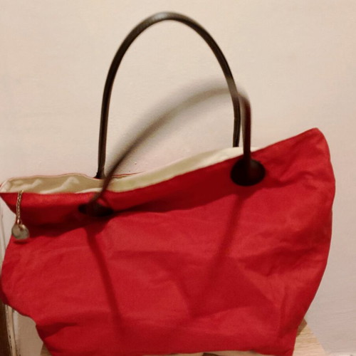 Kerastase shoulder bag used, red