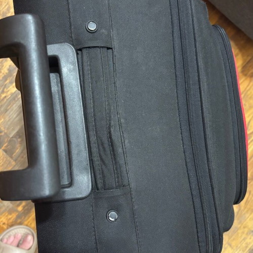 Benetton fabric black suitcase used with two wheels