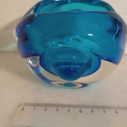 Blue glass ashtray like new, can be used as candle holder