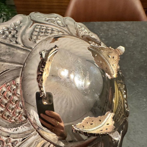 Vintage bowl with silver lining and engraved design, used
