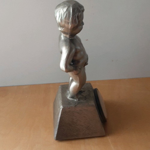 Vintage metal thermometer with small child figure like new