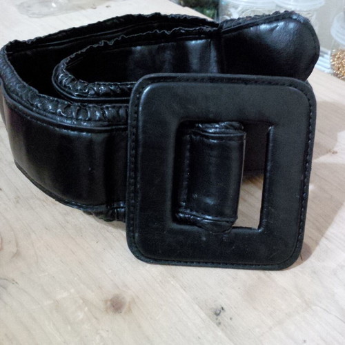 Wide black belt used, barely worn