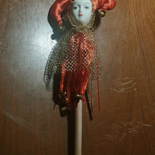 Decorative Harlequin figure on stick like new, red costume