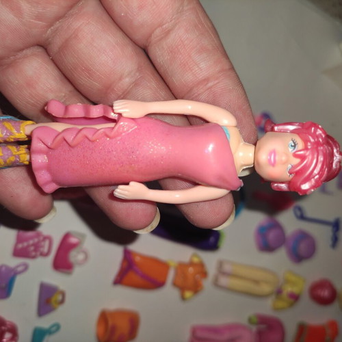 Polly Pocket bag with 9 dolls and accessories used
