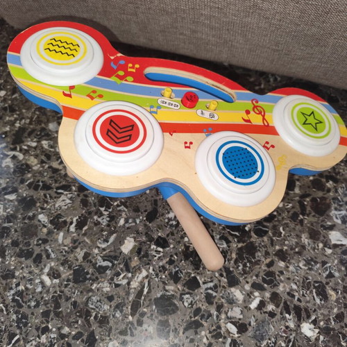 Wooden drum toy with music used