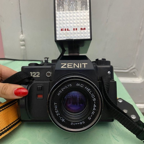 Vintage Zenit camera used with external flash