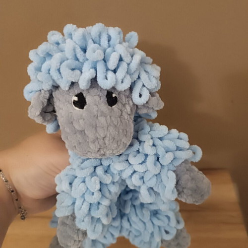 Handmade knitted cuddly sheep with soft velour yarn