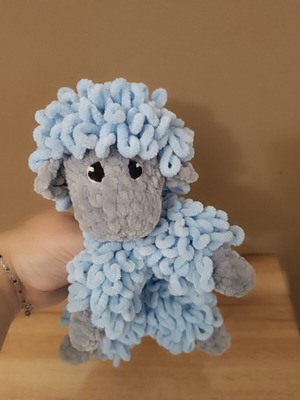 Handmade knitted cuddly sheep with soft velour yarn