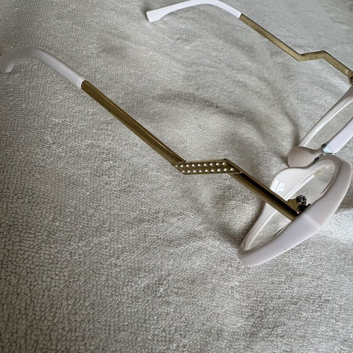 Glasses without myopia lenses, pink and gold accessory