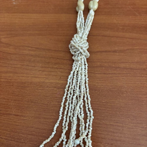 Handmade necklace used with small beads, beige