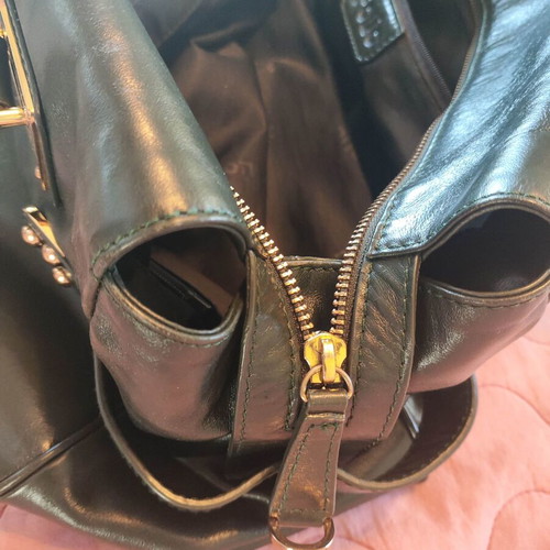 Folio leather women's handbag like new, dark green bowling style