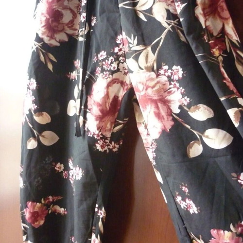 MELA LONDON floral print black jumpsuit medium used