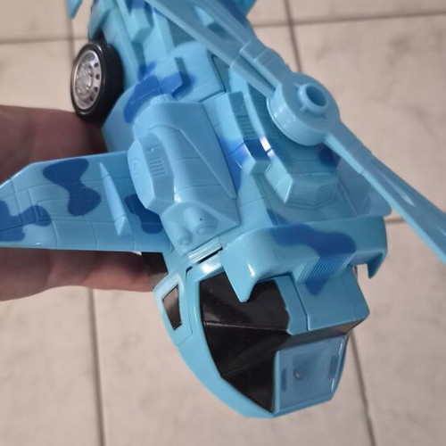 Electronic airplane transforming into robot toy