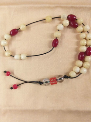 Κομπολόι ασπροκόκκινο με ζαράκι