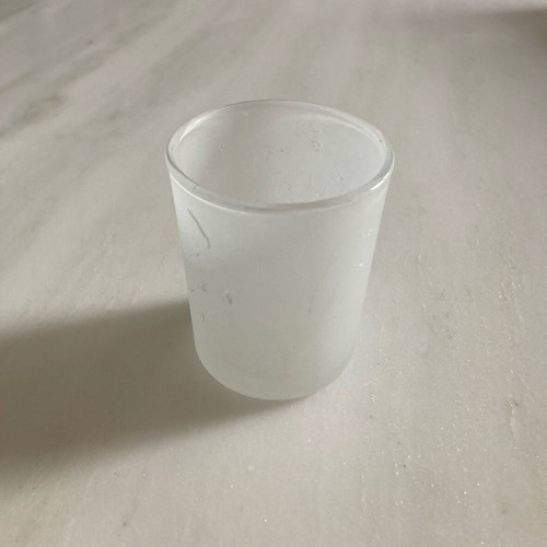 Opalescent glass tea light candle holder used