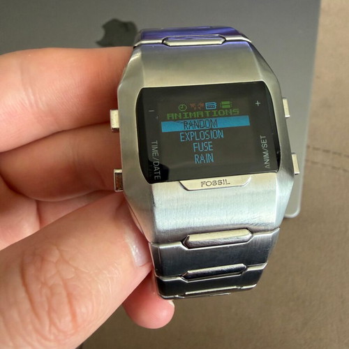 Fossil OLED JR-9465 watch like new, unisex, silver metal band