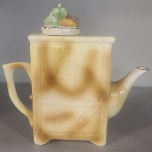 Porcelain vintage teapot used, height 15cm