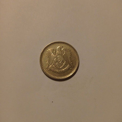 Rare coins used, possibly Libya, very good condition