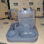 Cat Food Container like new with dry food and water bowl