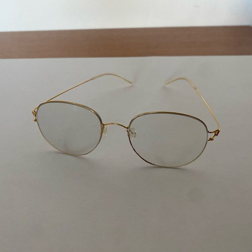 Glasses with ultralight titanium frame gold color, like new