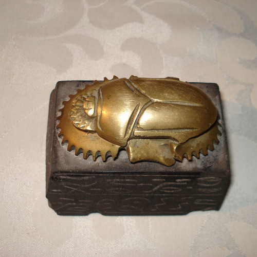Egyptian bronze decorative scarab used with black hieroglyph base