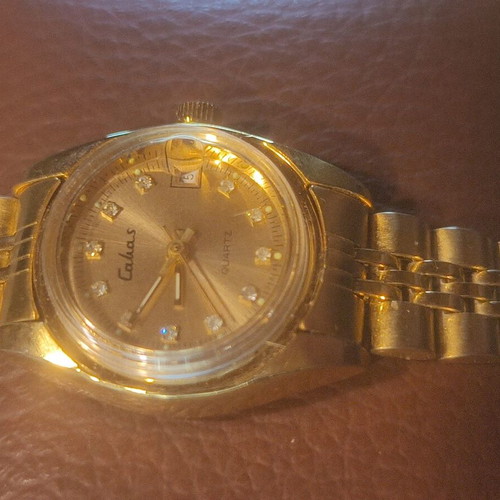 Calbas vintage ladies quartz watch, gold tone, date display