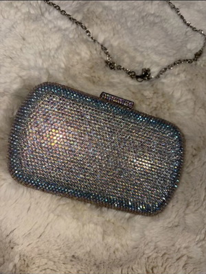 Clutch bag like new, silver