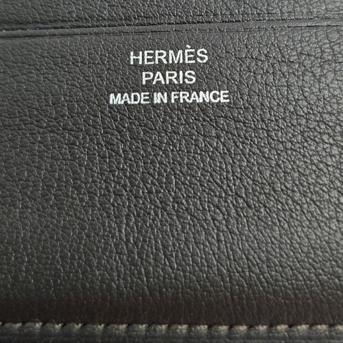 Hermes wallet like new, brown leather with silk lining