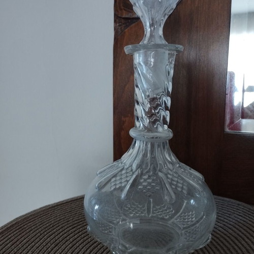 Carafe antique glass with decorative designs and original stopper, used