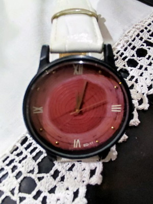 Wristwatch used, red-bordeaux, without battery