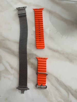 Apple Watch metal strap and Sport Band orange like new