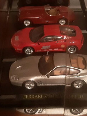 Ferrari metal miniatures like new, collection of 7 cars 1/43 scale