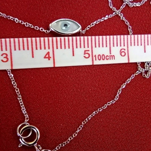 Gold necklace 375 with mother of pearl evil eye and side minimalist cross 45cm like new