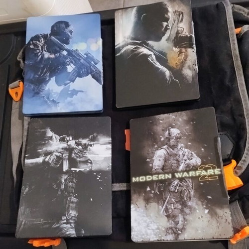 Call of Duty set for Xbox 360 used with 4 steelbooks and accessories
