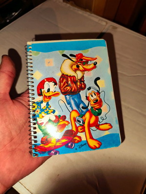 Notebook old intact with wear on back side