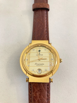 Luistar Swiss Made wristwatch like new, leather strap, gold color