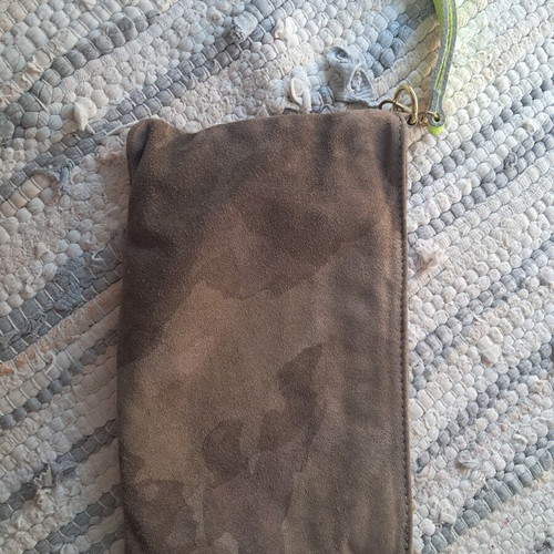 Leather wristlet bag with fluorescent details, Italy