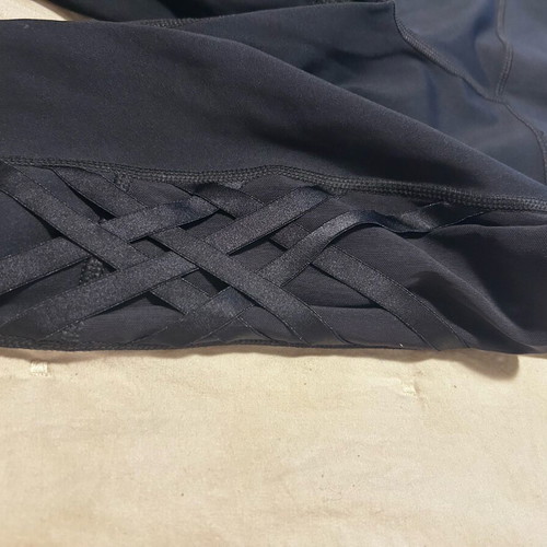Under Armour leggings like new with corset-style detail black