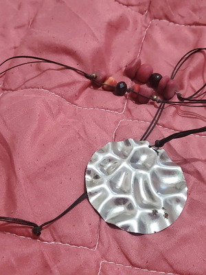 Long metal necklace with burgundy beads