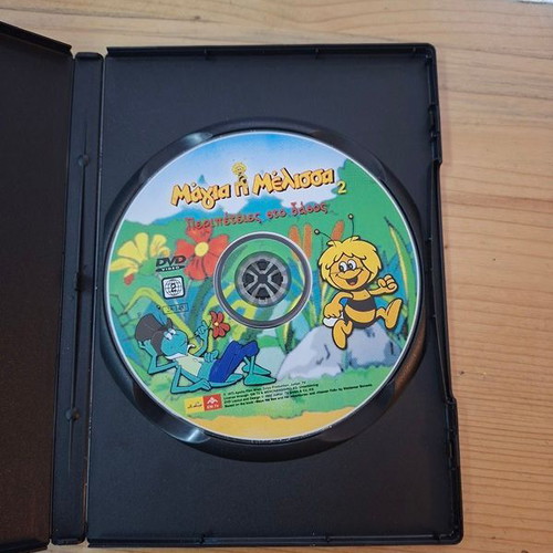 Collection of 10 children's animated DVDs with cases, dubbed
