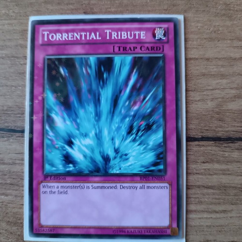 Torrential Tribute YuGiOh Card near mint, 1st Edition, Starfoil Rare