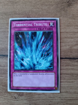 Torrential Tribute YuGiOh Card near mint, 1st Edition, Starfoil Rare