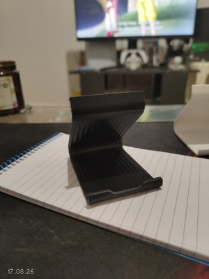 Black phone and tablet stand