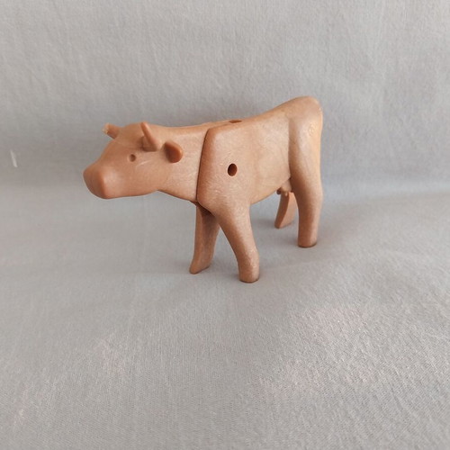 Playmobil cow used with small horn damage