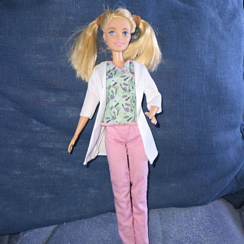 Barbie nurse used with clothes and extra nurse robe